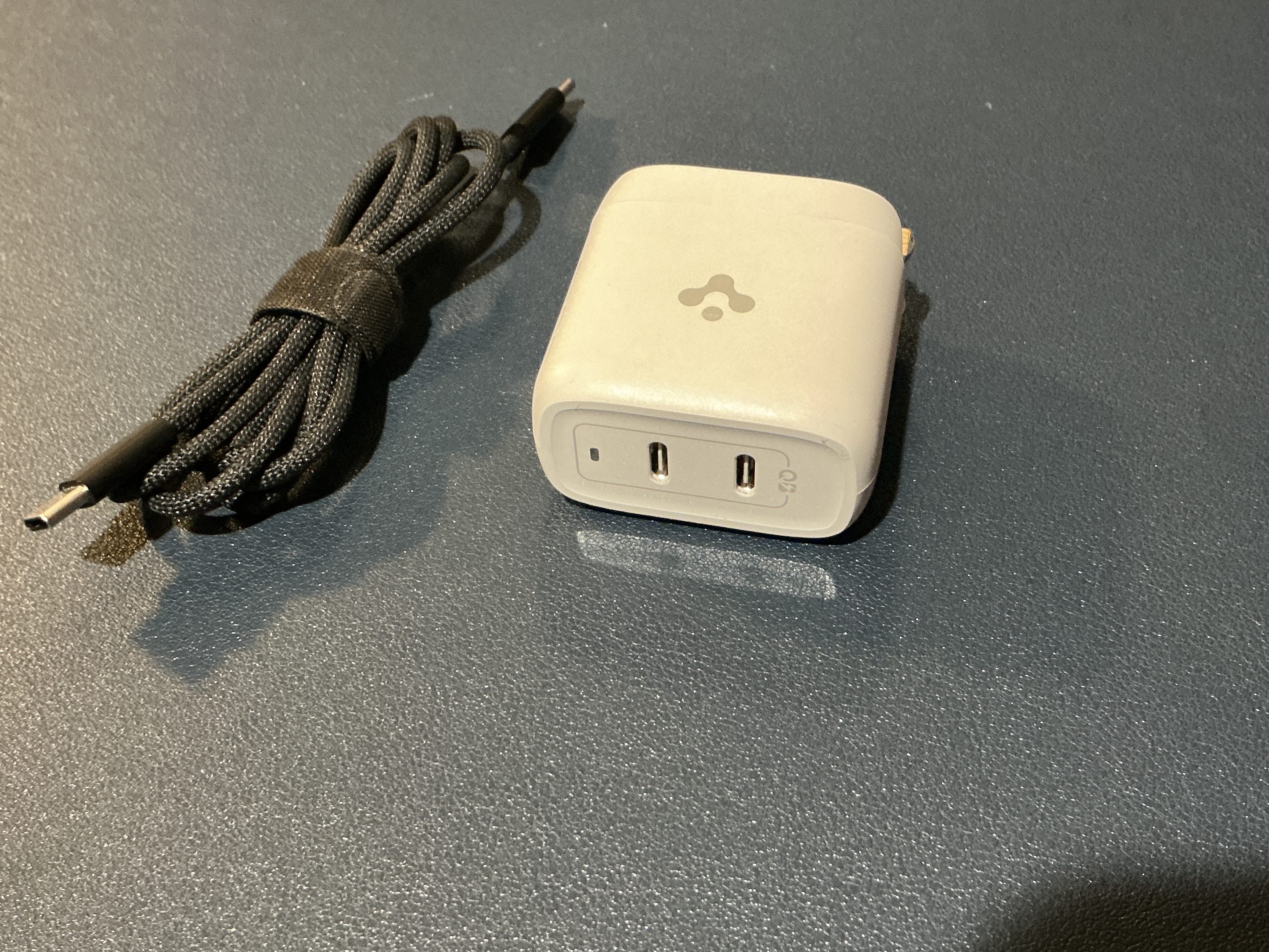 Image of a two-port USB charger with a USB cable
